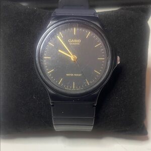 Casio MQ 24 Classic Black and Gold Timepiece
